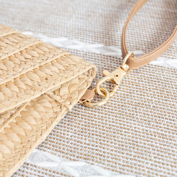 Woven Straw Flap Clutch with Tassel Accent