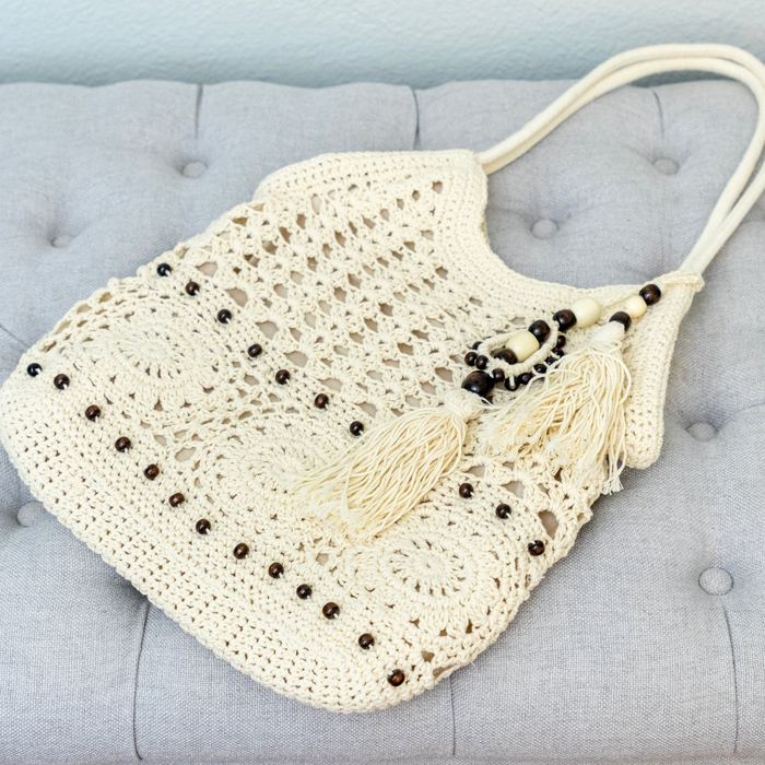 Openwork Crochet Hobo Tote with Tassel and Wooden Bead