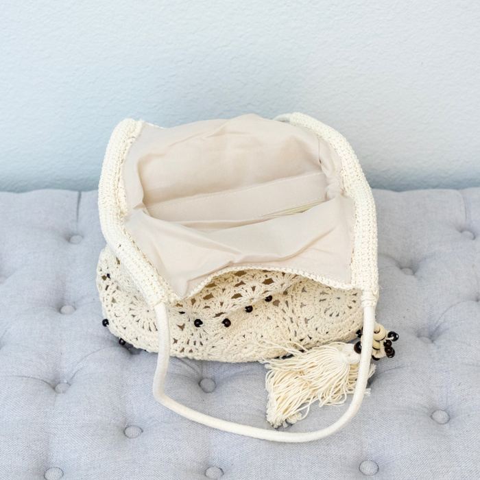 Openwork Crochet Hobo Tote with Tassel and Wooden Bead