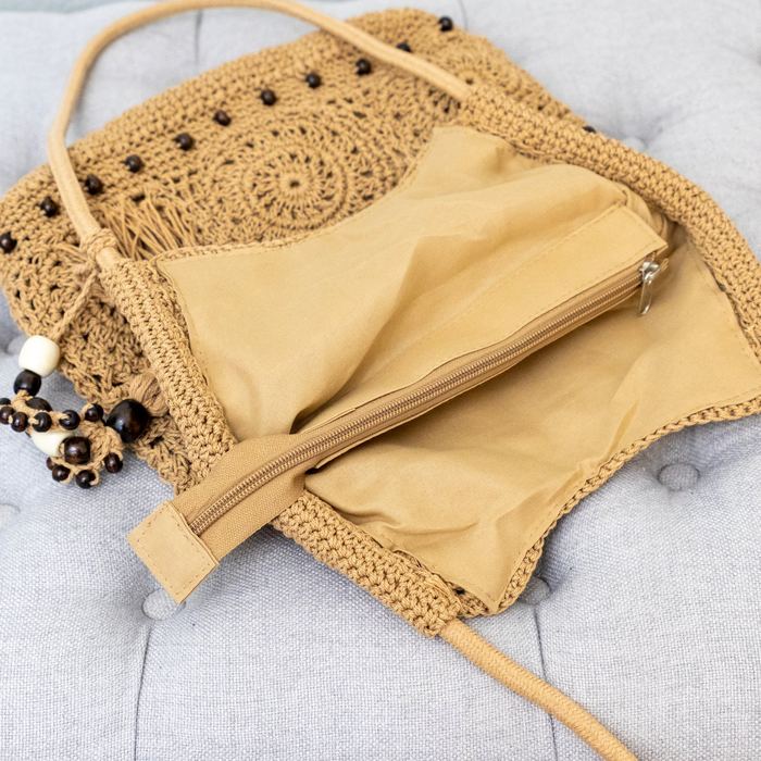 Openwork Crochet Hobo Tote with Tassel and Wooden Bead